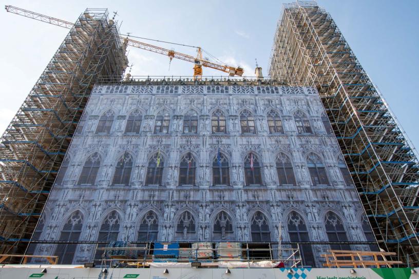 Construction hoarding on the façade of the town hall